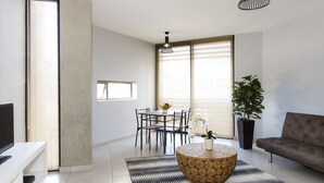 TV - Wild Olive Apartments (Windhoek)