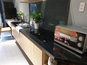 Microwave - Tripporo - Homestay (Ho Chi Minh City)