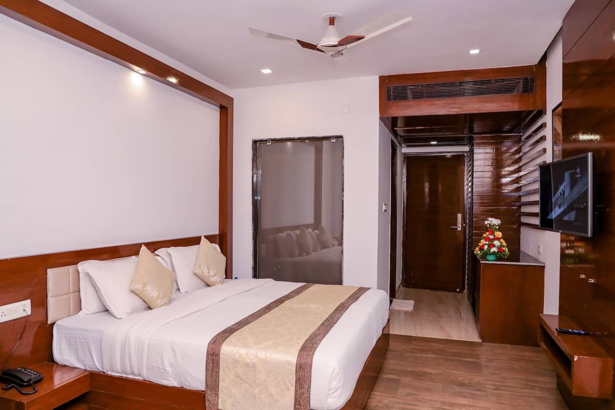 1 quarto, frigobar, cofres nos quartos, escrivaninha