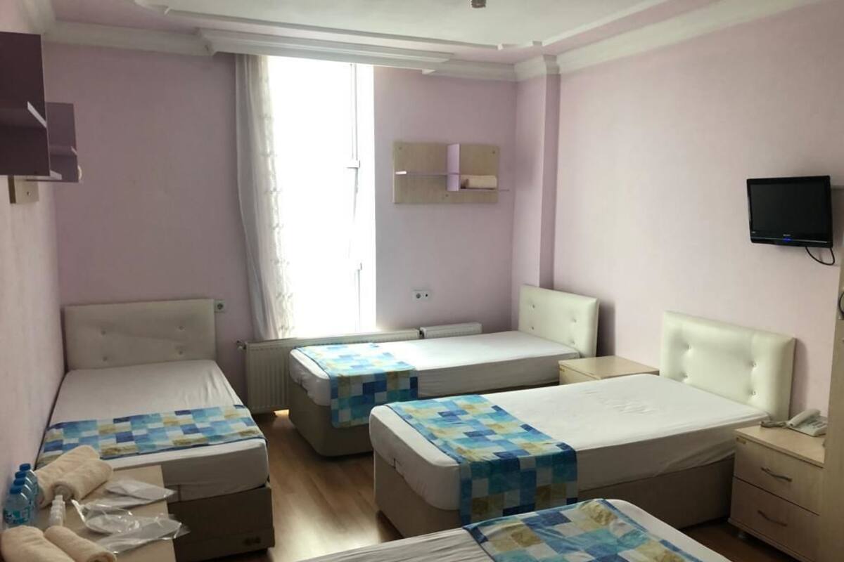 Habitación cuádruple | Wifi gratis y ropa de cama