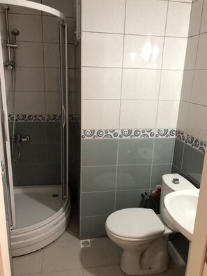 Shower, rainfall showerhead, designer toiletries, slippers