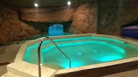 Seasonal outdoor pool, open 11:00 AM to 10:00 PM, pool umbrellas