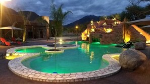 Seasonal outdoor pool, open 11:00 AM to 10:00 PM, pool umbrellas