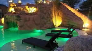 Seasonal outdoor pool, open 11:00 AM to 10:00 PM, pool umbrellas