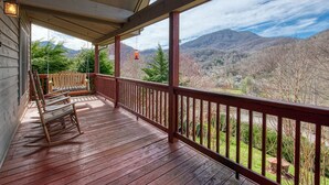 A wooden deck with a railing overlooking a mountainous landscape. - 2 BD 2 BA Cottage, Paved Access, Close to Town, Super Views, Cable, WIFI, (Waynesville)