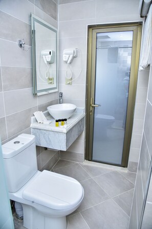 Family Room, 2 Bedrooms | Bathroom | Shower, hair dryer, slippers, towels - Supreme Hotel Baku (Baku)