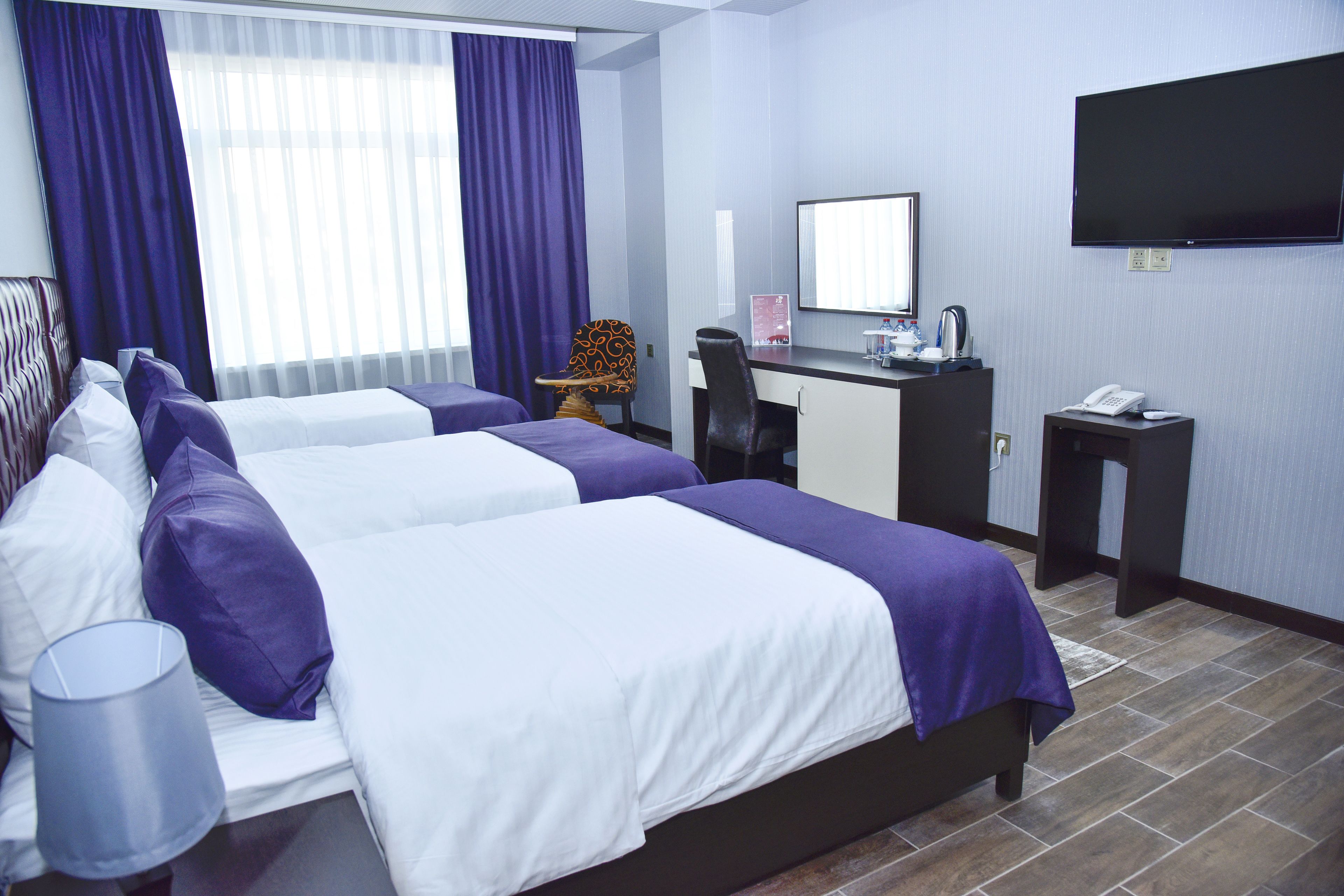 comfort triple room | in-room safe, desk, iron/ironing board, free cots/infant beds