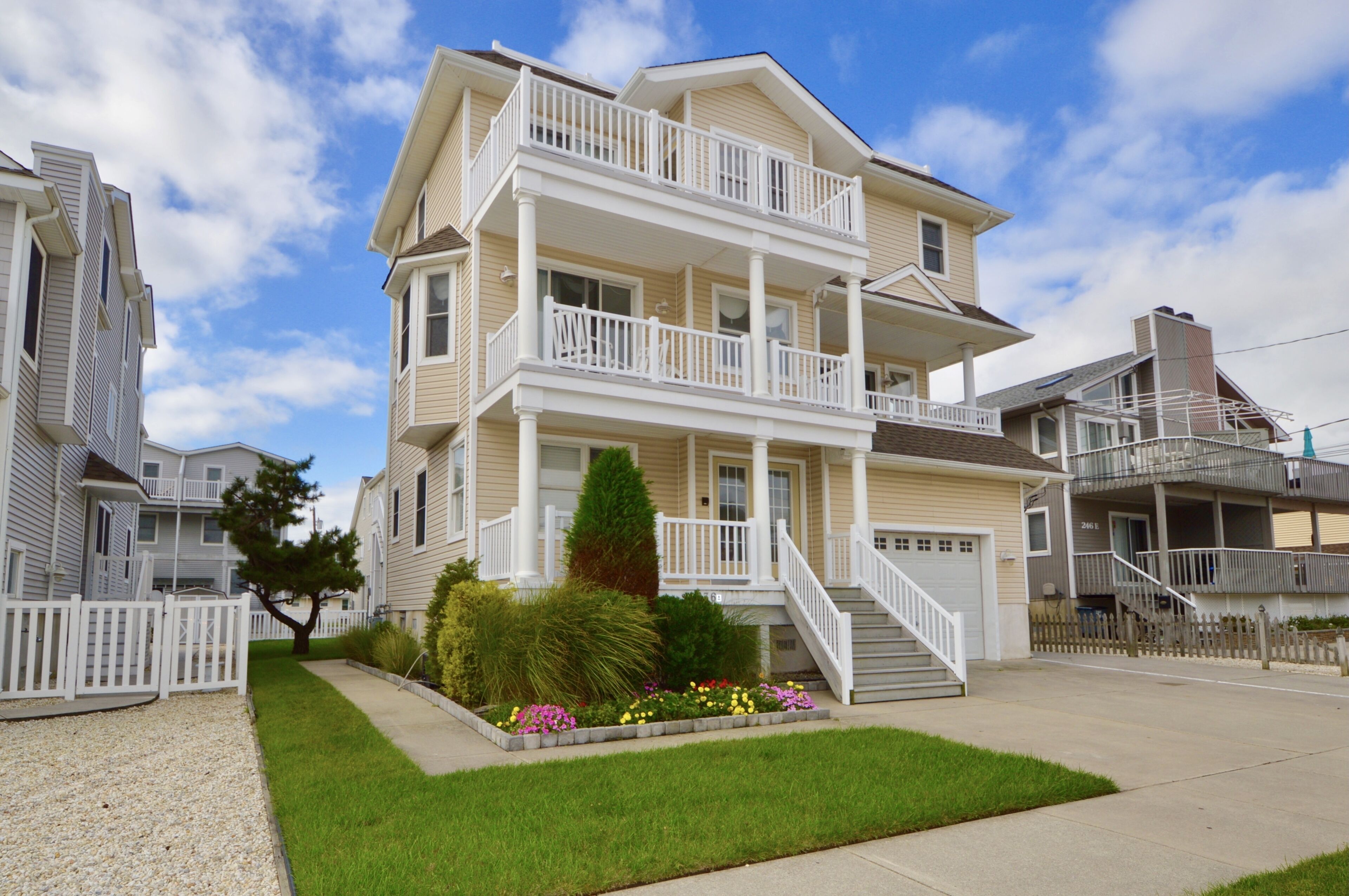 BRIGHT AND AIRY, BACK PORCH which leads to a roof deck. OFF STREET PARKING enough for one car