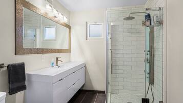 Shower, hair dryer, towels, soap