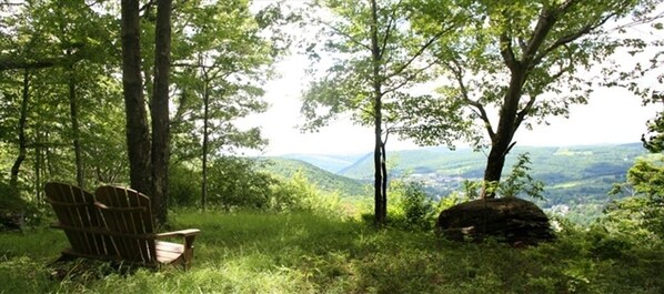 Relax in a serene hillside setting with breathtaking views of the surrounding valley.