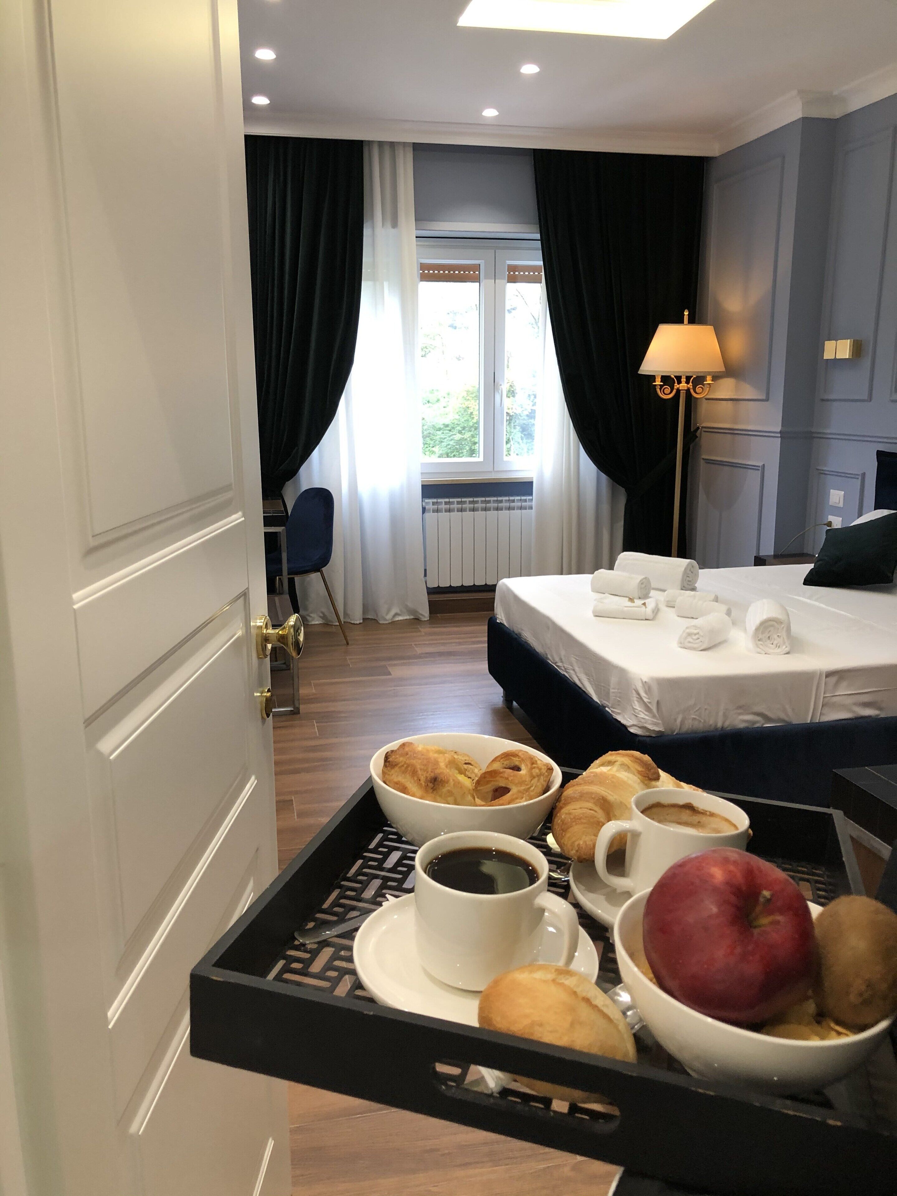 Foto - Unicum Roma Suites