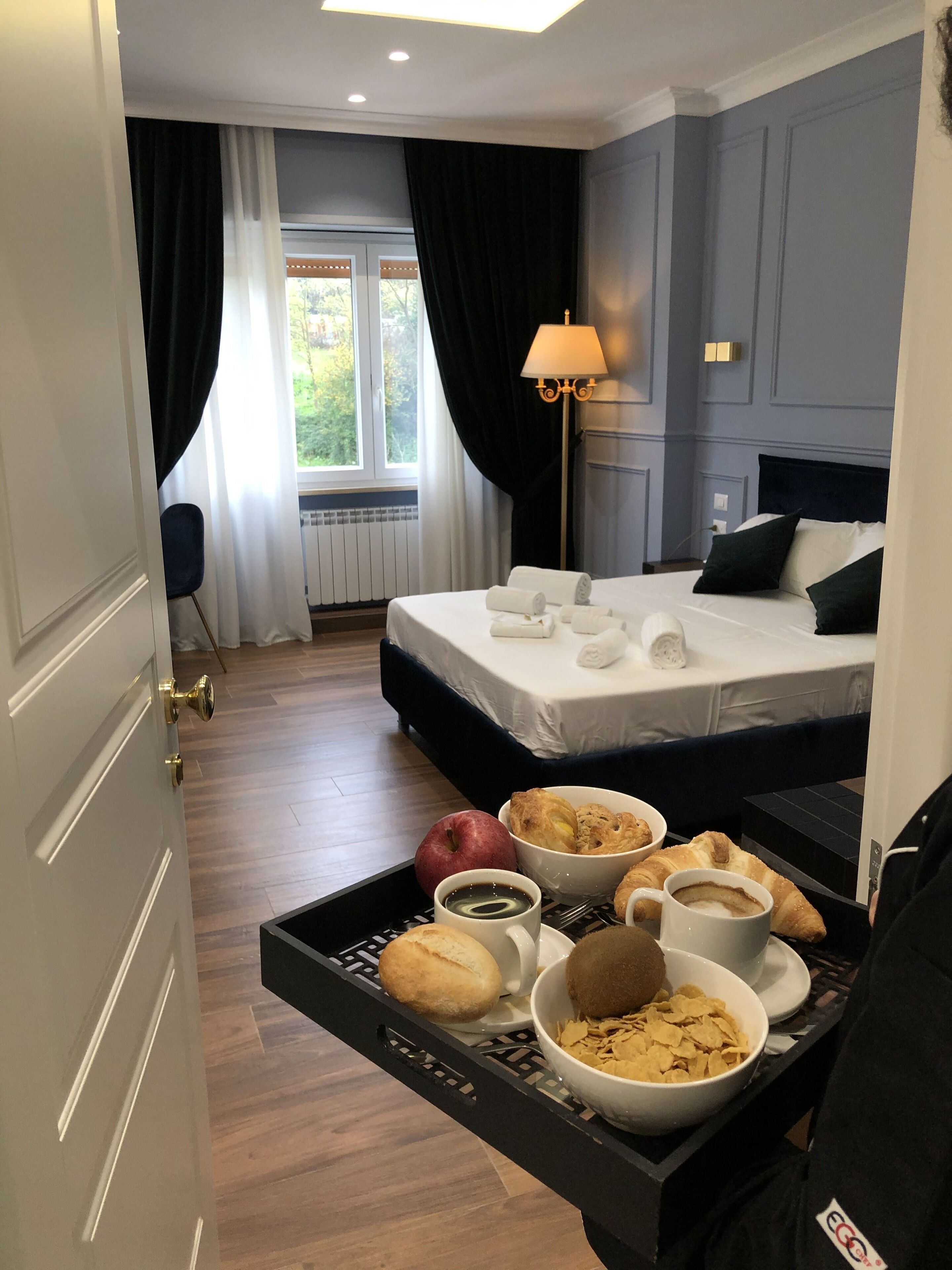 Foto - Unicum Roma Suites