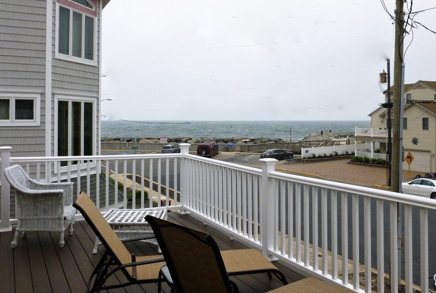 Charming two story upside down style home uniquely situated with an astounding ocean view