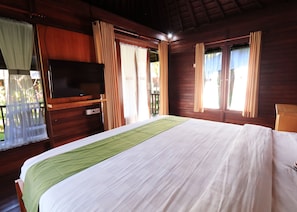 Chambre Deluxe, vue sur le jardin | Minibar, coffre-fort, décor unique, ameublement unique