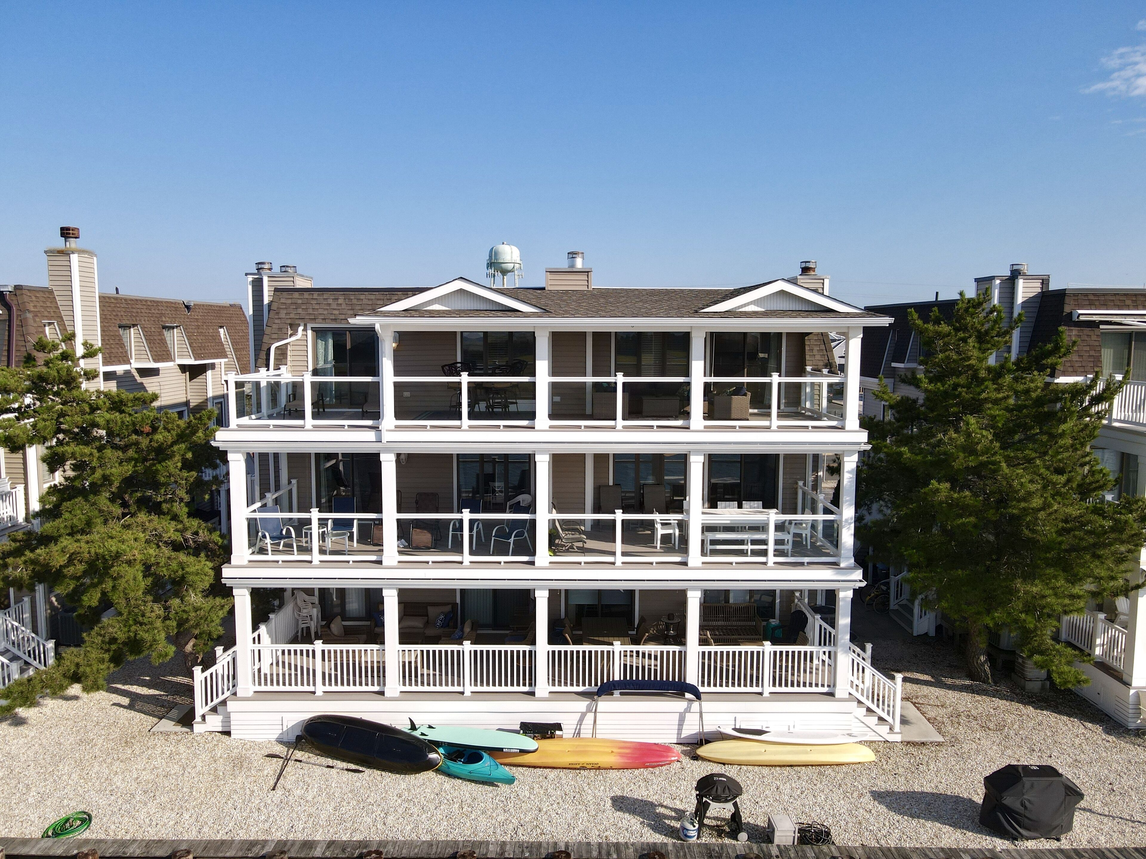 Beautiful Views of waterway, wetlands and Sunsets from this well maintained Penthouse unit