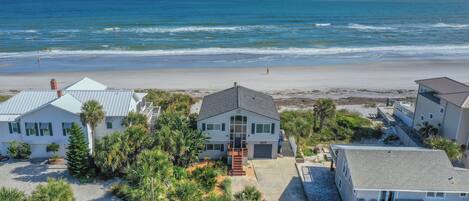 On the beach, sun loungers, beach towels