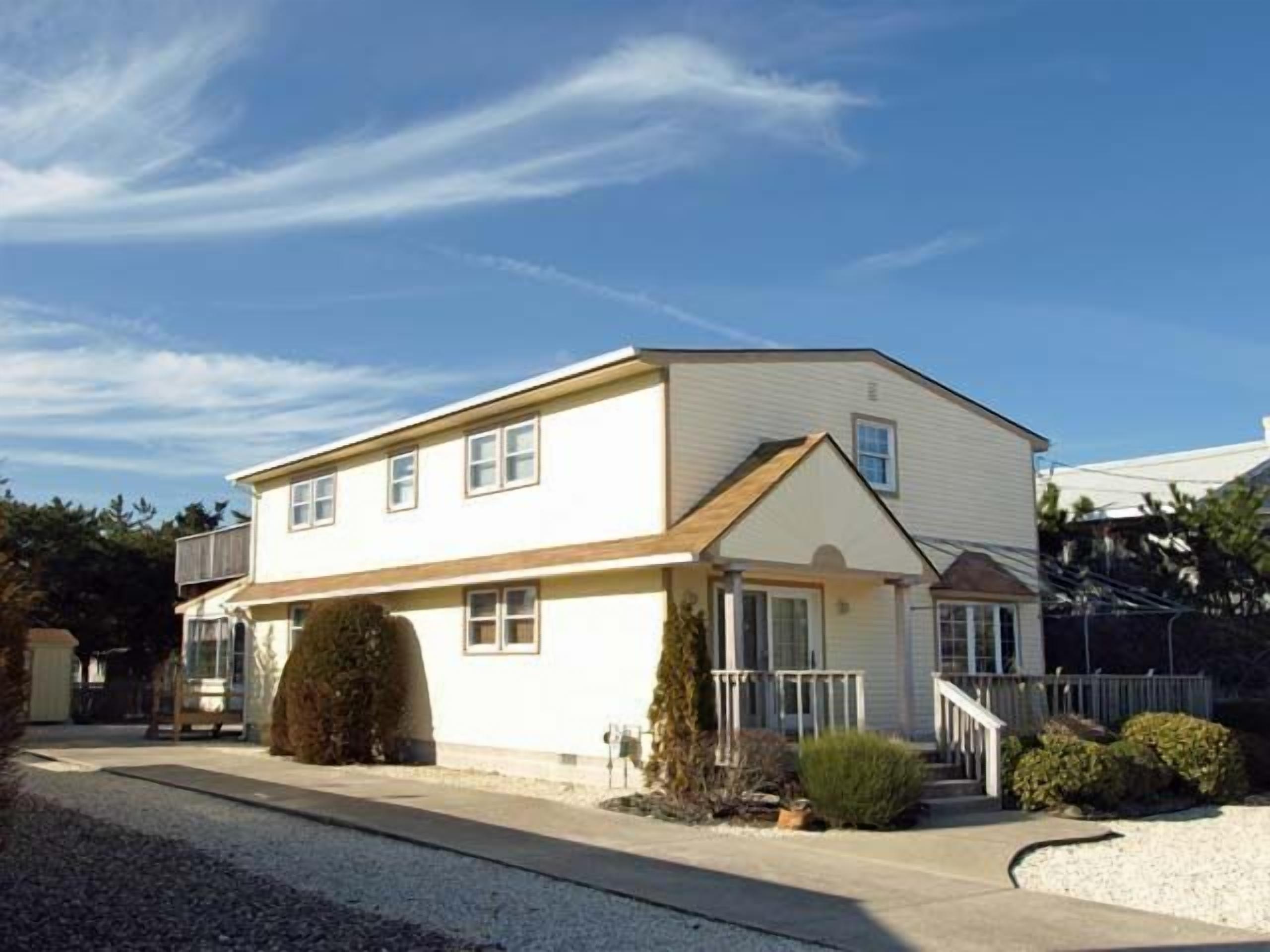 Located just 2 blocks to the beach. Enjoy cool nights in the screened in porch out back