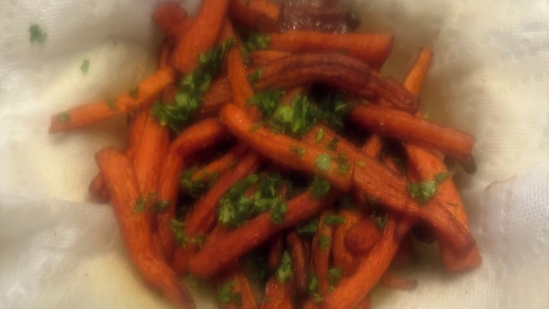 A close-up of a dish with julienned carrots and chopped herbs. - Destination getaway! B&B Italian Manor. Italian cooking classes. “Organic” (Ruston)