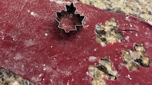 A red surface with a star-shaped cutout and a metal object on a granite countertop. - Destination getaway! B&B Italian Manor. Italian cooking classes. “Organic” (Ruston)
