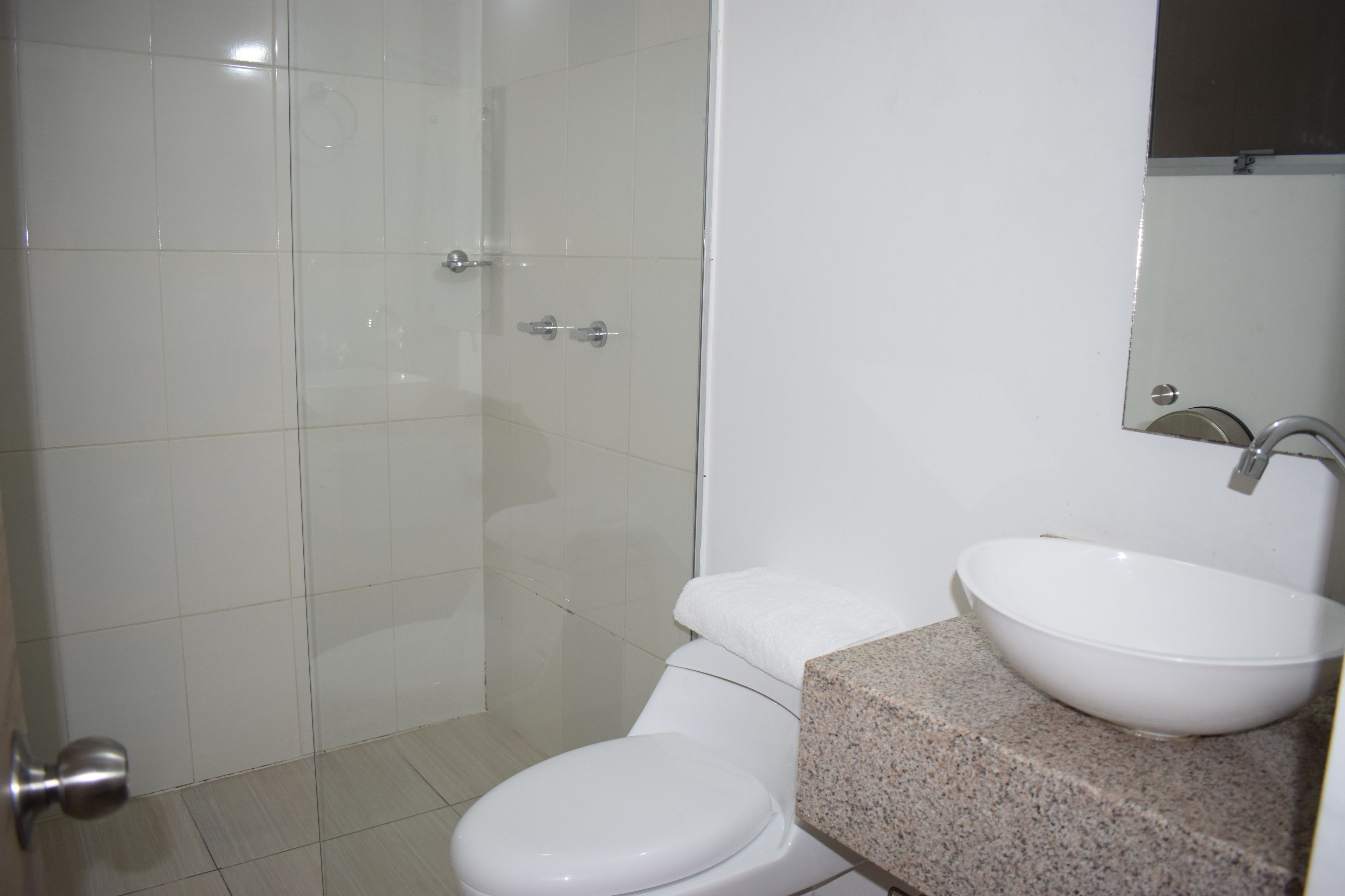 Standard Room, 1 Double Bed | Bathroom | Shower, rainfall showerhead, towels, soap