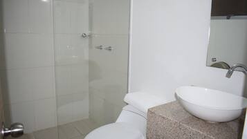 Standard Room, 1 Double Bed | Bathroom | Shower, rainfall showerhead, towels, soap
