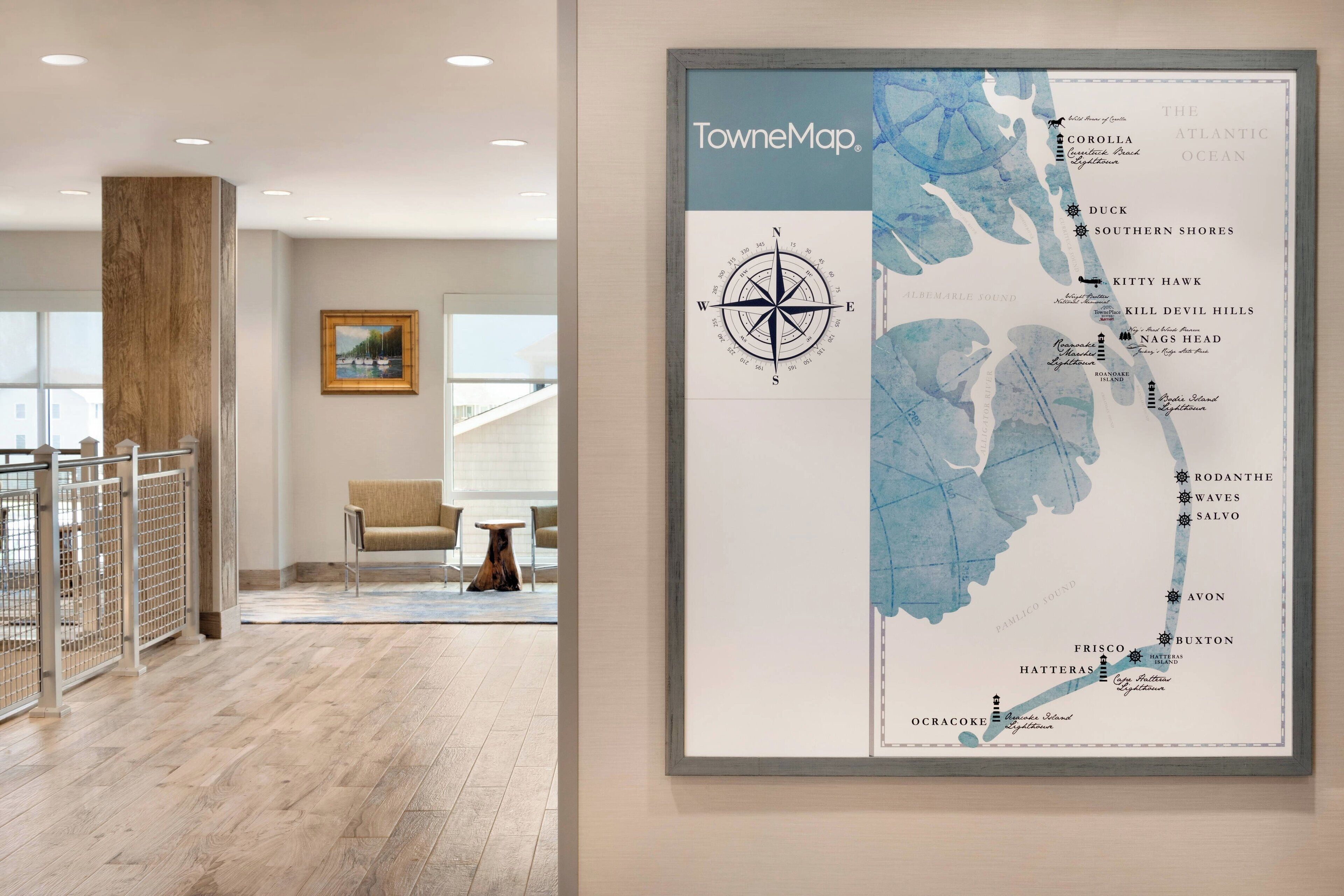 A framed map of the Atlantic Ocean with labeled locations and a compass rose.