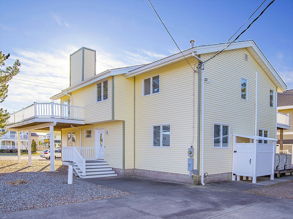 Comfortable, 4 bedroom 2-bath home, located just 1 short block from the beach.