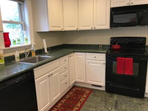 Fridge, microwave, dishwasher, coffee/tea maker