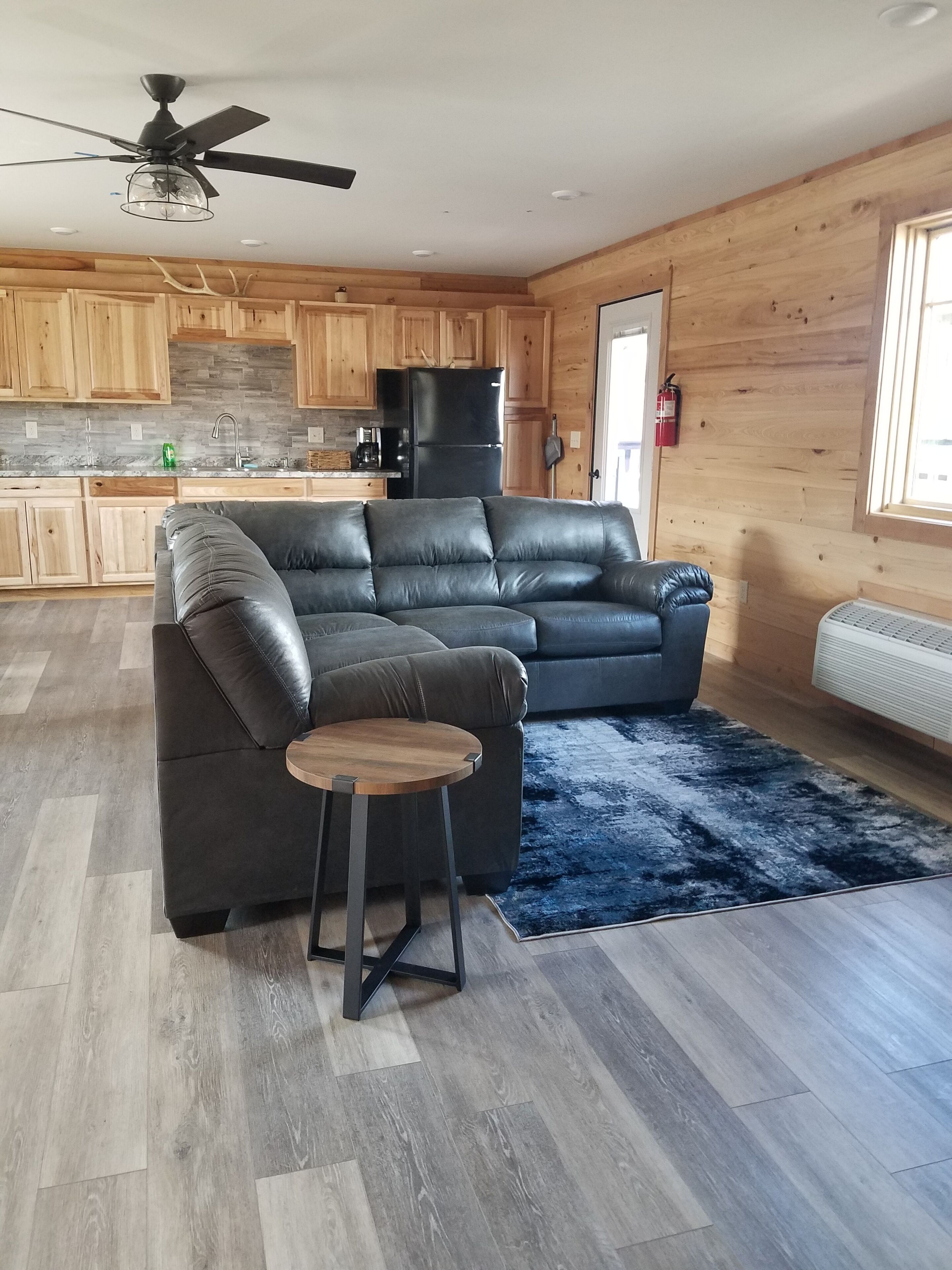 comfort condo, 1 bedroom, river view | living area | 50-inch flat-screen tv with satellite channels, tv