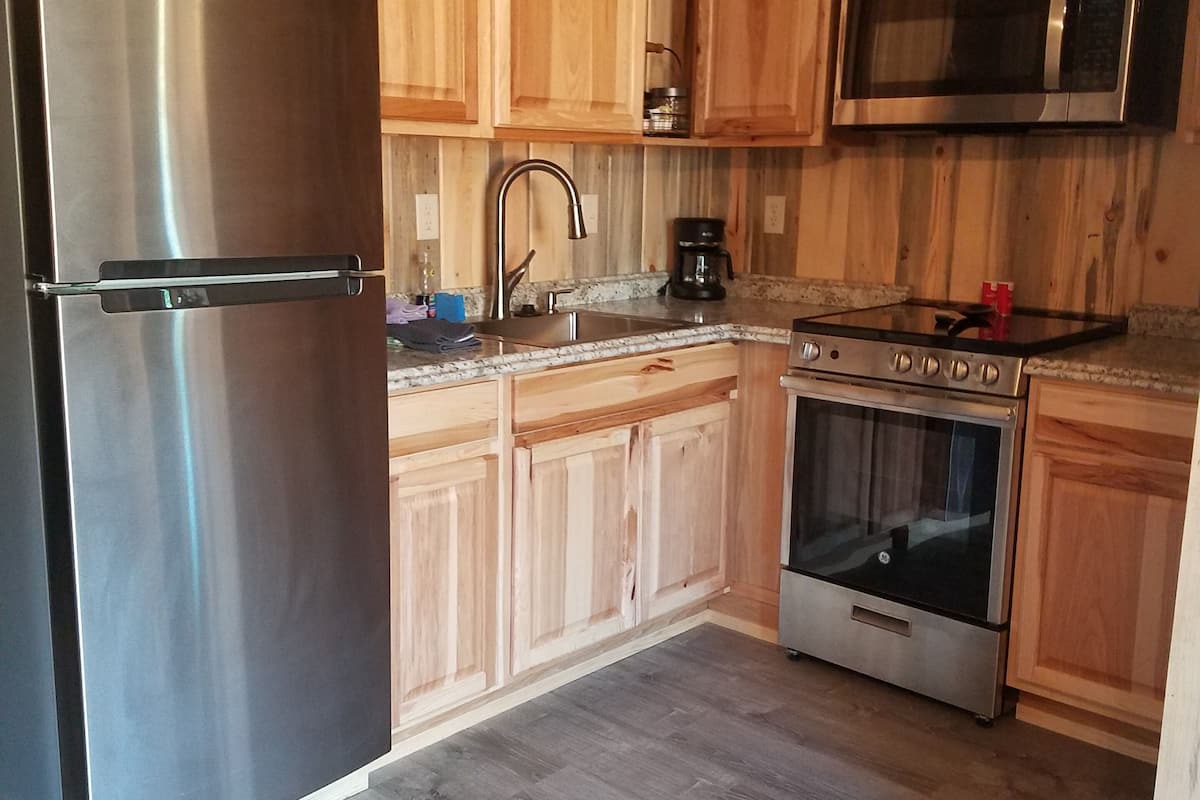 comfort cabin, 2 queen beds | private kitchen | fridge, microwave, coffee/tea maker