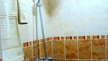 Shower, free toiletries, hair dryer, slippers