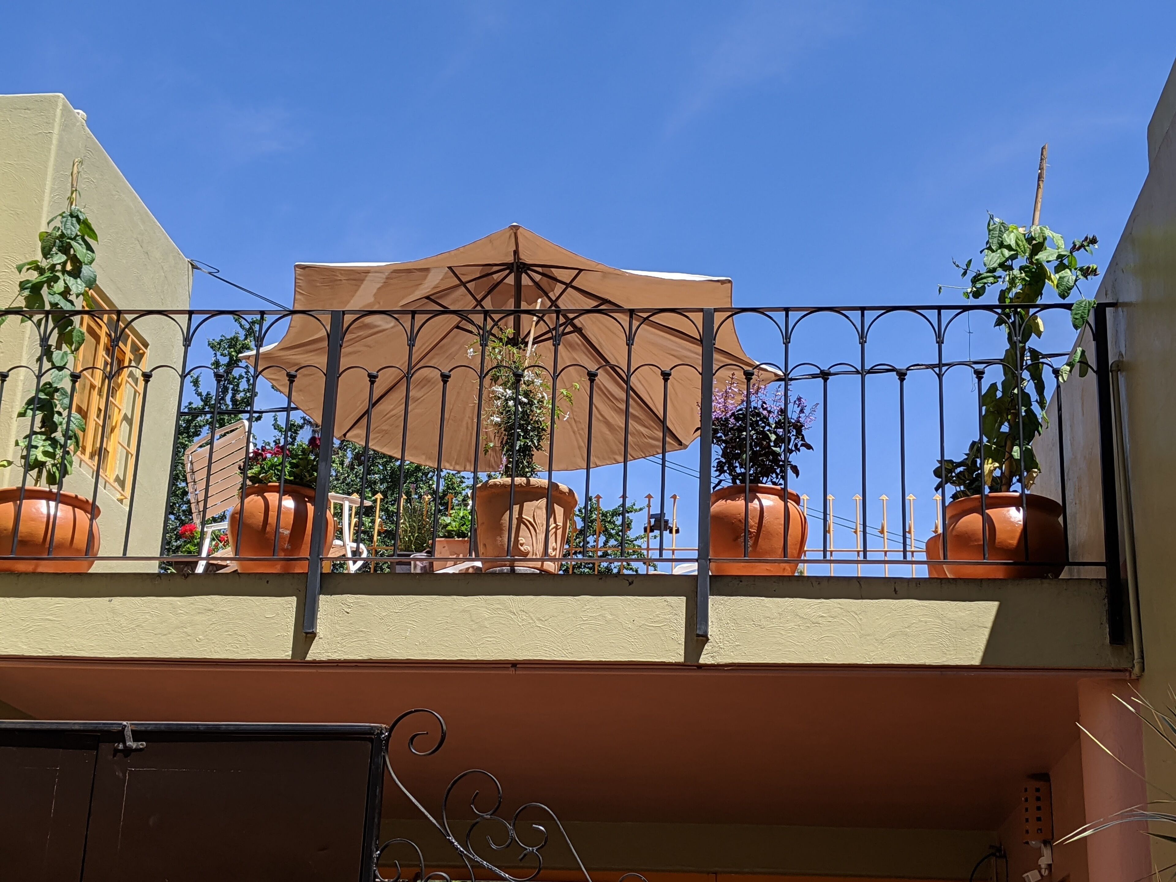 Second floor balcony with view of the mountains.
