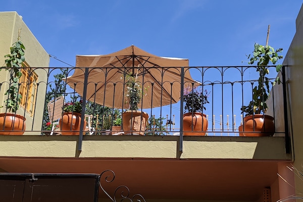Second floor balcony with view of the mountains.