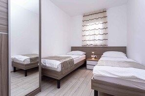 2 habitaciones, cuna de viaje y acceso a internet