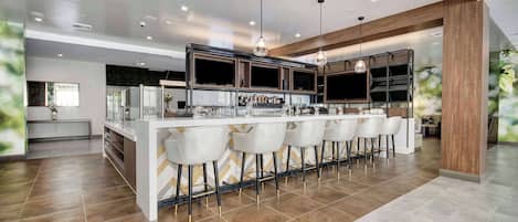 Outdoor pool, open 6:00 AM to 10:00 PM, pool loungers