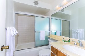 Bathtub, hair dryer, towels