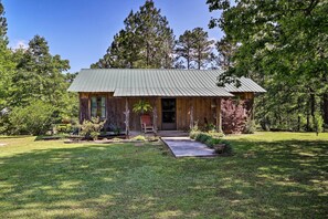 Property grounds - Secluded Cabin w/ Pond ~ 37 Mi to Gulf Coast! (Wiggins)