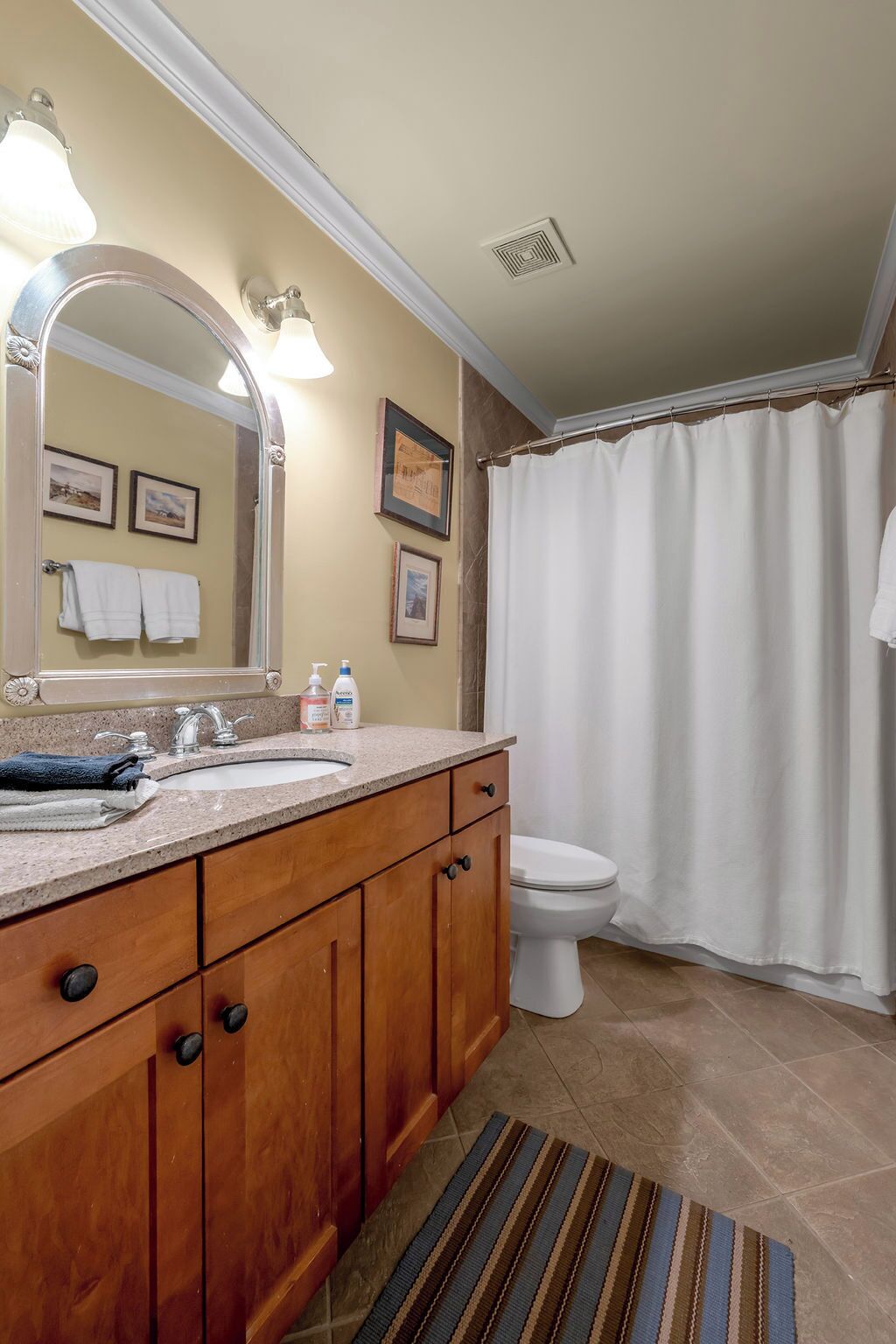 Combined shower/tub, hair dryer, towels, soap