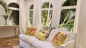 TV, fireplace, books - Old Northwood Heated Pool Home perfect for  virtual family, business, vacation.  (West Palm Beach)