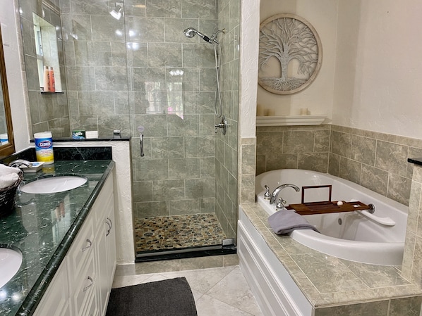 Bathtub, jetted tub, hair dryer, towels
