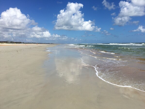 On the beach, sun loungers, beach towels