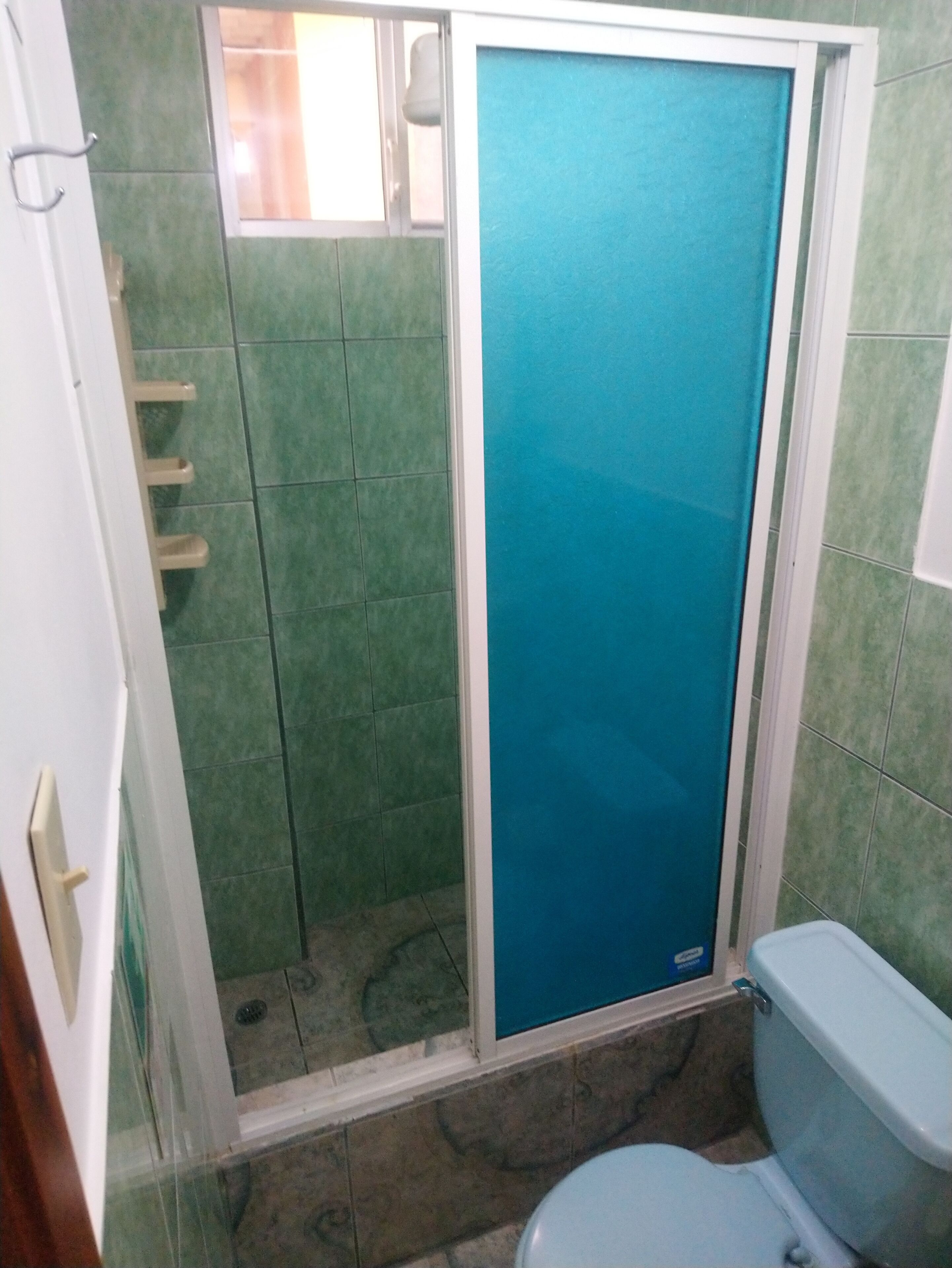standard double room | bathroom | shower, hair dryer, towels, soap