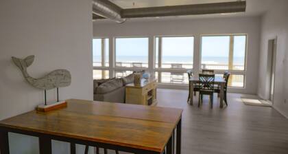 BEACHFRONT on 1 acre lot with incredible beach and bay views.