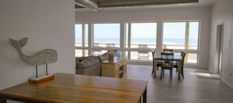 BEACHFRONT on 1 acre lot with incredible beach and bay views.