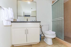 Bathtub, hair dryer, towels