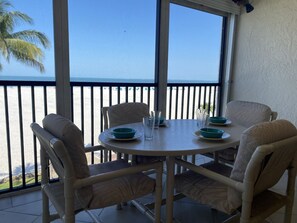 Outdoor dining - Sunset #301 - Luxurious Gulf-front Condo with Beach Access (Fort Myers Beach)