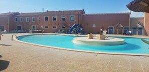 Outdoor pool, a heated pool, pool loungers
