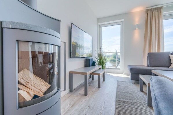 Fernseher, Kamin