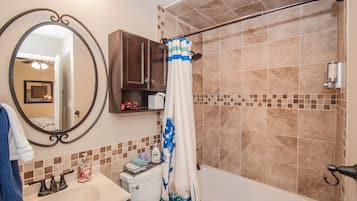 Combined shower/tub, hair dryer, towels, soap