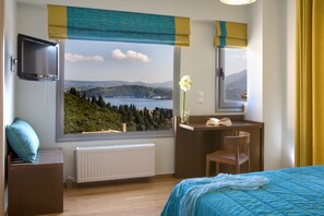 2 chambres, coffres-forts dans les chambres, fer et planche Ă repasser